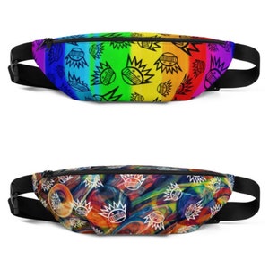 May include: Two fanny packs with a black strap and zipper. The first fanny pack has a rainbow background with a black and white graphic of a face with a crown. The second fanny pack has a colorful abstract background with a black and white graphic of a face with a crown.