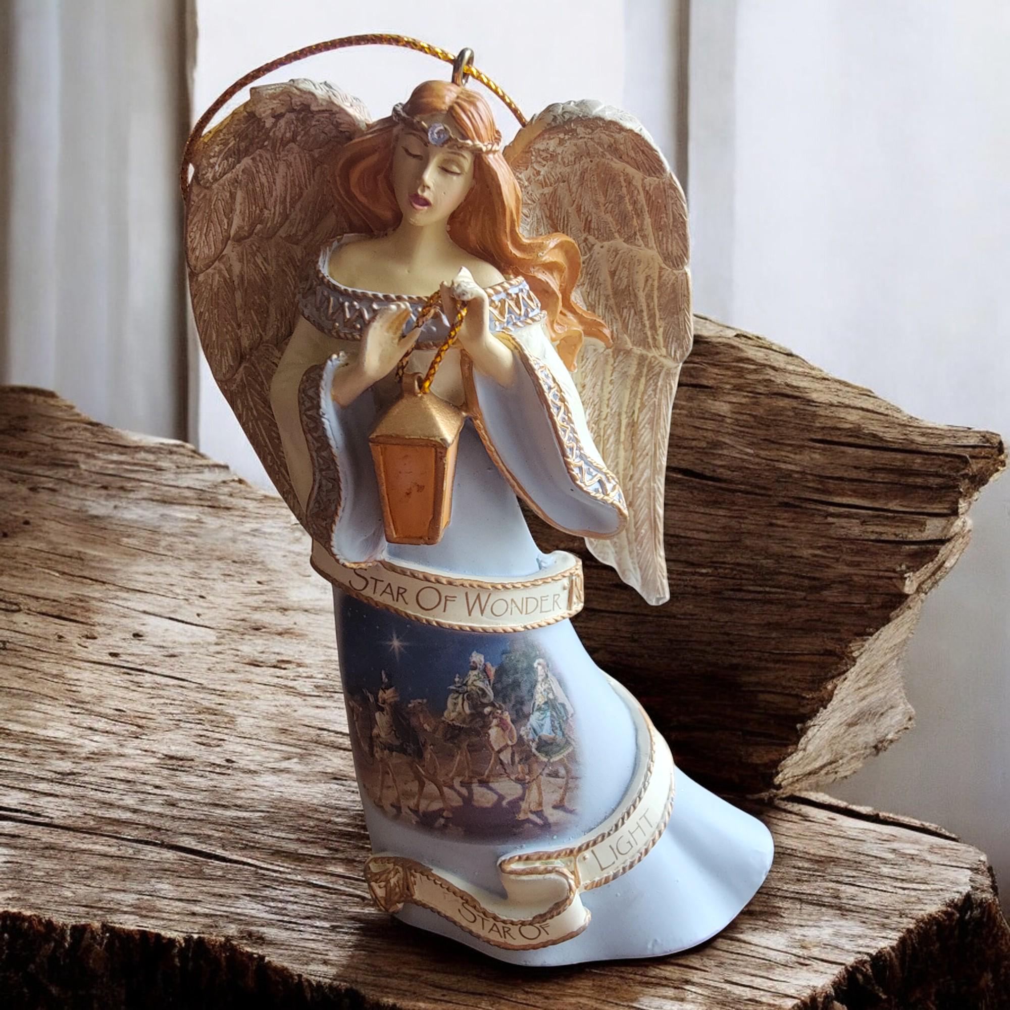 トーマス キンケード オーナメント Amazon.co.jp: 回るサンタとトナカイ ツリートップ 星のオーナメント