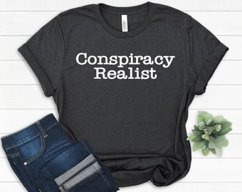 Réaliste, complot, cadeaux rigolos, théorie du complot, théoricien du complot, t-shirt complot, t-shirt complot, chemise podcast