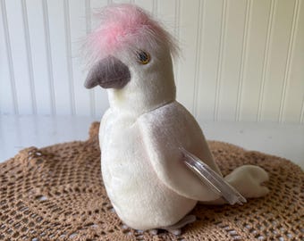 KUKU: Ty Beanie Baby, cacatúa de peluche colorida, 1998, sin usar ni exhibir.
