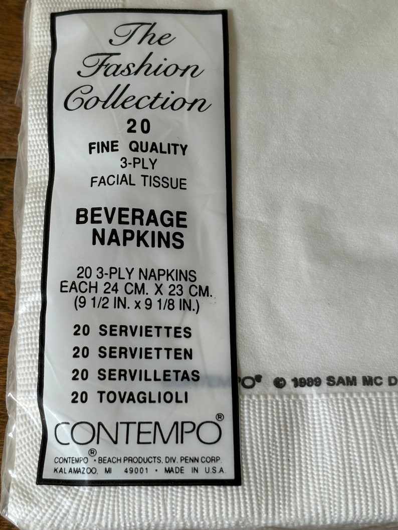 May include: A package of white beverage napkins from The Fashion Collection. The package includes 20 three-ply napkins, each measuring 9 1/2 inches by 9 1/8 inches. The package also includes the text "Facial Tissue".