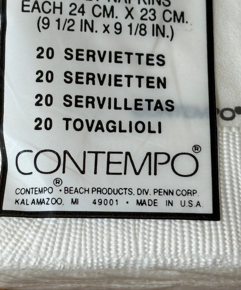 May include: White paper napkins, each measuring 9 1/2 inches by 9 1/8 inches, are packaged in a clear plastic wrap. The label includes the brand name "Contempo" and the text "Made in U.S.A."