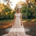 Unique Light Champagne Short Cap Sleeve Lace Appliqué See Through Back with Button A Line Chapel Train Romantic Wedding Dress Bridal Gown 