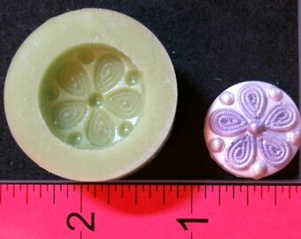 Silicone Mold  used to make flower button  with wax, Candle, gypsum, resin, hot glue, soap, clay, concrete, metal.  Embellishment