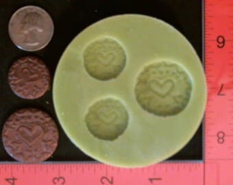 Silicone Mold Medallion Heart used with wax, Candle, gypsum, resin, hot glue, soap, clay, concrete, metal