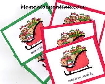 6 Handmade Note Cards A2 with Envelope.  Christmas Santa Sled with Penguin, Dog, Cat, Lion Sentiment "Sledding with a Holiday Hi"