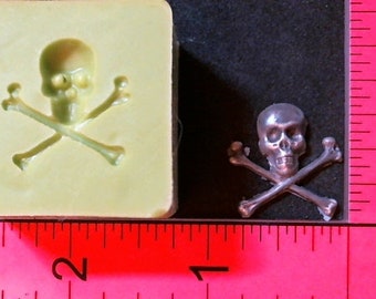 Silicone Mold Skull Cross Bones jewelry used with wax, Candle, gypsum, resin, hot glue, soap, clay, concrete, metal