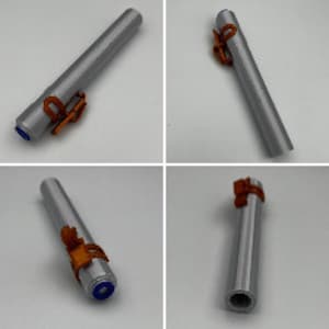 May include: A silver metal tube with a blue end cap and two brown leather straps. The straps are secured with metal buckles.