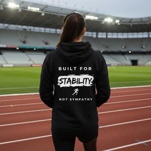 Built for Stability Not Sympathy Hoodie | Empowering Amputee Gift | Motivational Unisex Fleece Pullover with Back Print