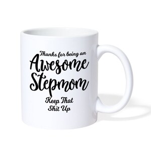 May include: White ceramic coffee mug with black text that reads "Thanks for being an Awesome Stepmom Keep That Shit Up".