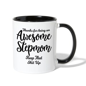May include: White ceramic coffee mug with a black rim and handle. The mug has black text that reads "Thanks for being an Awesome Stepmom Keep That Shit Up".