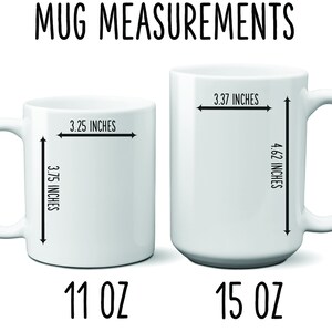 May include: Two white ceramic mugs with measurements in inches and ounces. The smaller mug is 3.25 inches wide and 3.75 inches tall and holds 11 ounces. The larger mug is 3.37 inches wide and 4.62 inches tall and holds 15 ounces.