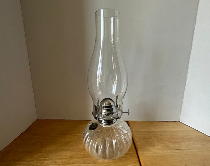 Clear glass Lamplight Farms small ribbed oil lamp with wick and chimney