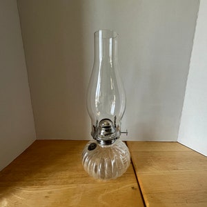 Clear glass Lamplight Farms small ribbed oil lamp with wick and chimney