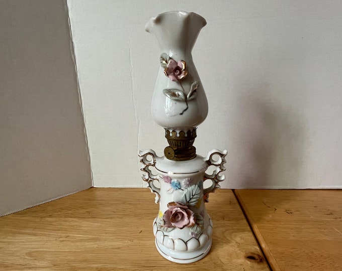 Vintage medium pink 2 handle rose porcelain oil lamp with matching chimney and wick with rose and leaf appliques