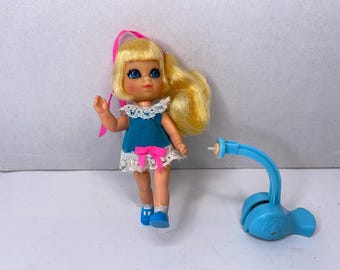 1967 Mattel Liddle Kiddles Suki Skediddle Doll with  "pusher" or "skediddler" mechanism that allows the doll to walk.