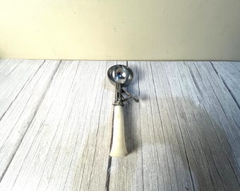 Vintage Cream-colored handle ice cream scoop