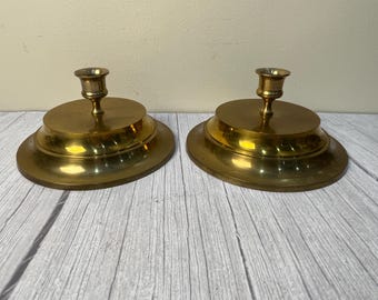 Pair of polished brass 3 tier taper candlestick holders