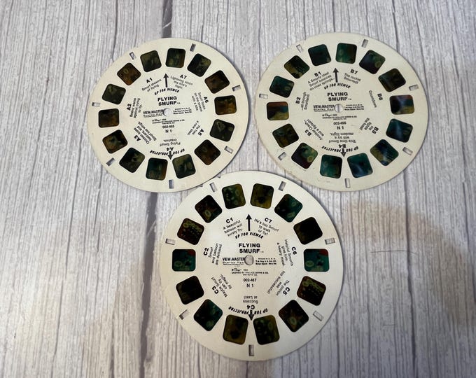 1982 Wallace Berrie & CO. Flying Smurf 3-reel set