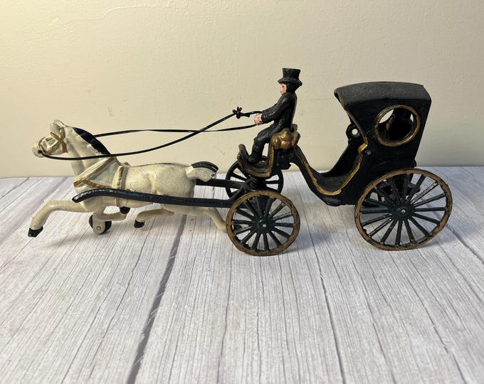 4-piece cast iron Amish horse and carriage