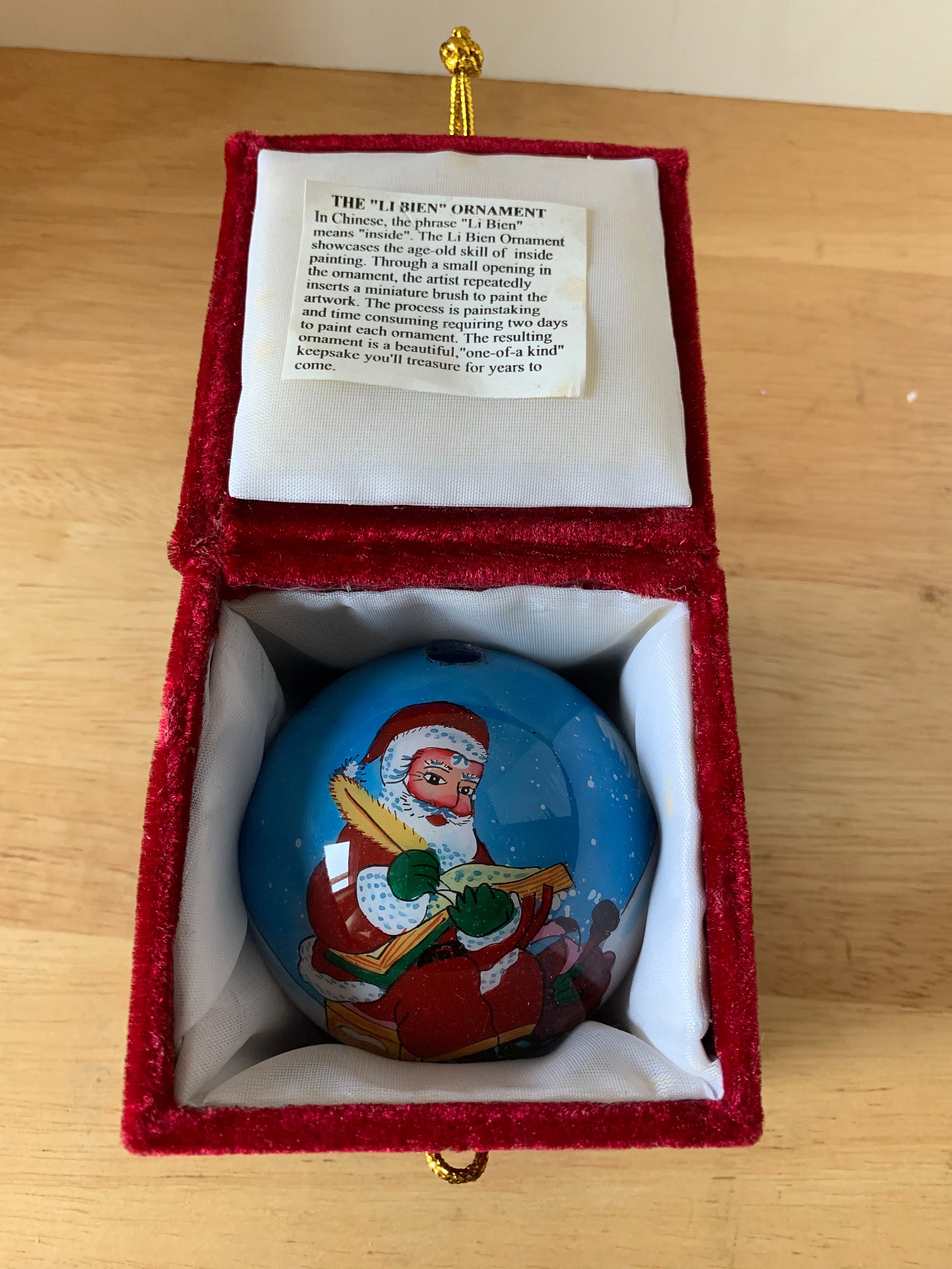 Li Bien inside painted christmas ornament