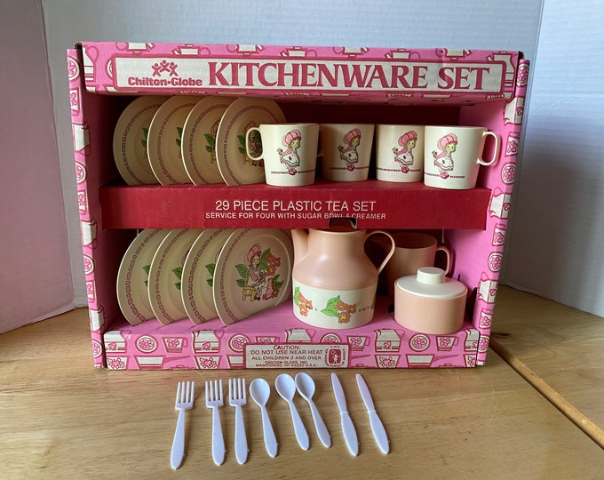 Strawberry Shortcake-like 24 piece set of Plastic Dishes, cups, coffee pot, creamer, sugar and silverware in original box by Chilton-Globe