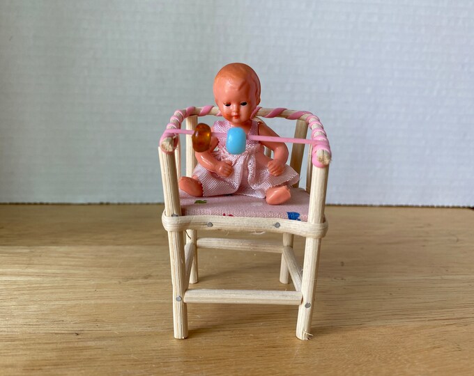 1960s German brand Caco  plastic toy baby doll in wicker Highchair