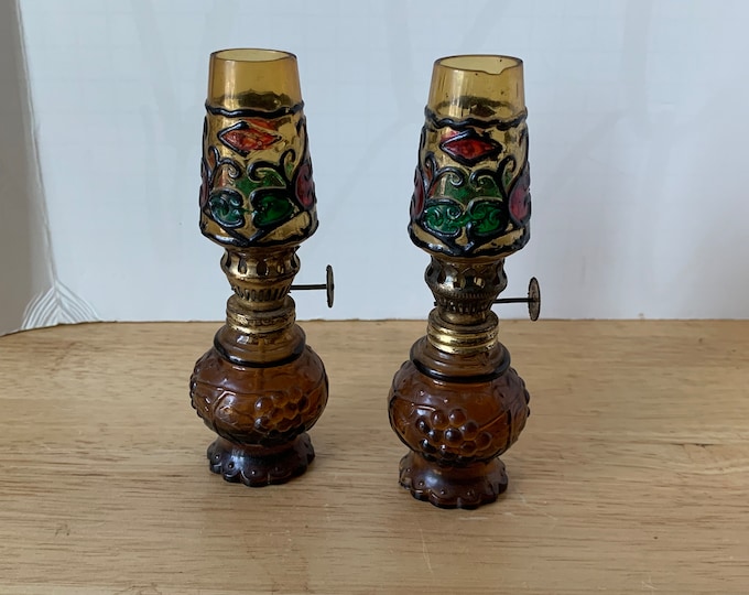 Vintage pair of miniature oil lamps with multi-colored base with wick and chimney