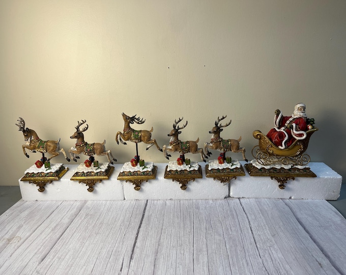 Joesph Studiios Santa and 5 reindeer stocking holders in original box and packing