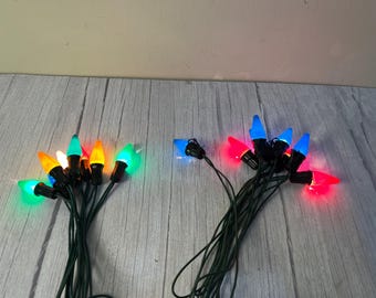 Choice of vintage Clem Co. (clip) or no name C 7 swirl and fluted 8 string Christmas lights