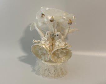 Vintage Coast Novelty Love Birds Wedding Cake Topper w/ 2 Large Bells, 2 large doves holding a rhinestone wedding band between their beaks