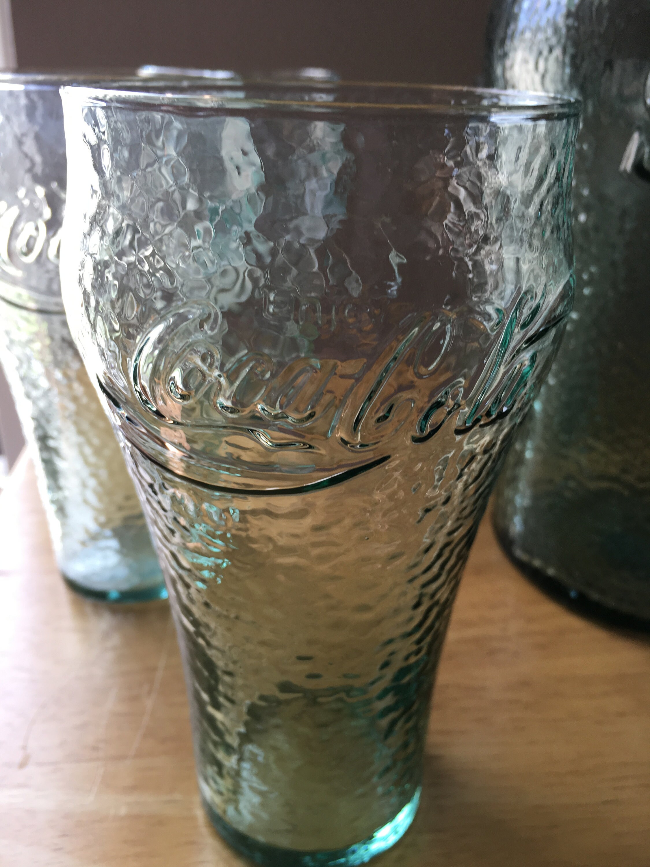 Green bubble glass Coke pitcher and 8 green bubble glass coke glasses