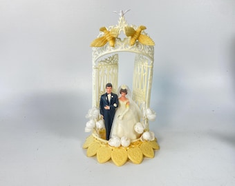 1950s-60s Wilton Plastic Bride and Groom Wedding Cake Topper with Gated Archway with doves and faux flowers
