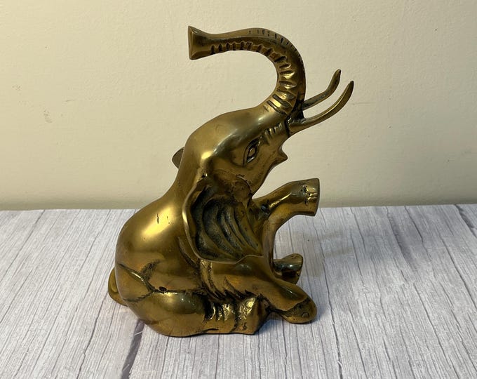 Sitting Brass elephant sculpture