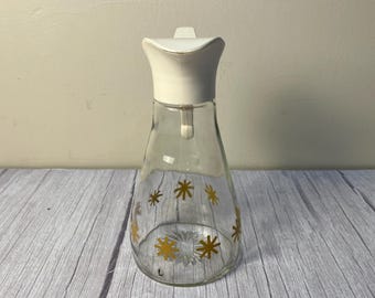 Vintage medium MCM Log Cabin plastic cream top starburst glass bottom syrup dispenser