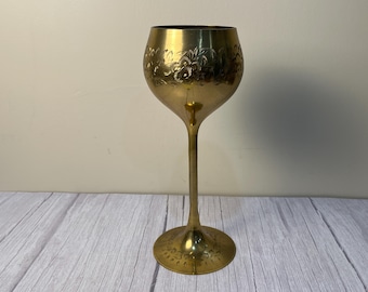 Tall brass Chalis with etched flowers and leaves