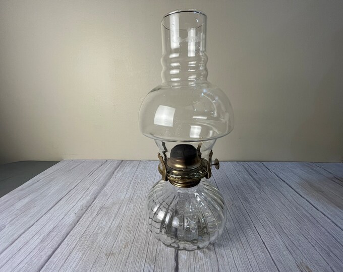 vintage "Golden Globe" medium clear pumpkin pattern oil lamp with bubble chimney and wick