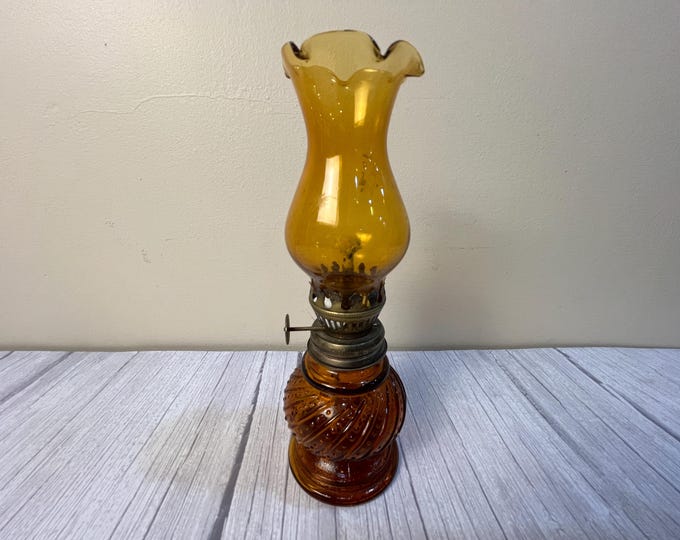 Amber vintage hobnail swirl oil lamp with Amber scalloped chimney and wick