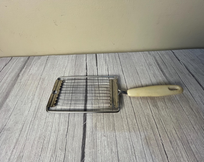 Vintage Rostfrel Stainless Steel Tomato Slicer