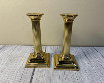 Vintage pair of Baldwin brass Smithsonian Institution candle holders