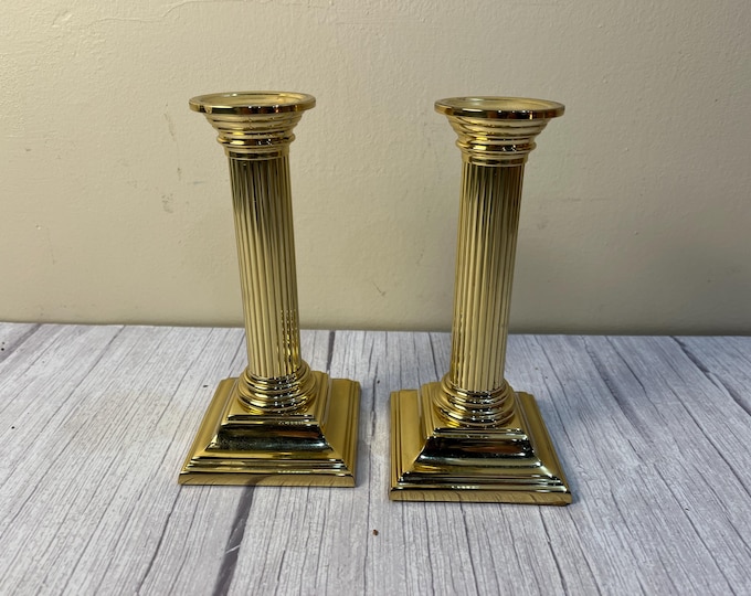 Vintage pair of Baldwin brass Smithsonian Institution candle holders