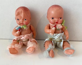 Set of 2 -  1940s Vintage Celluloid Baby Boy and Girl Doll holding Bottles