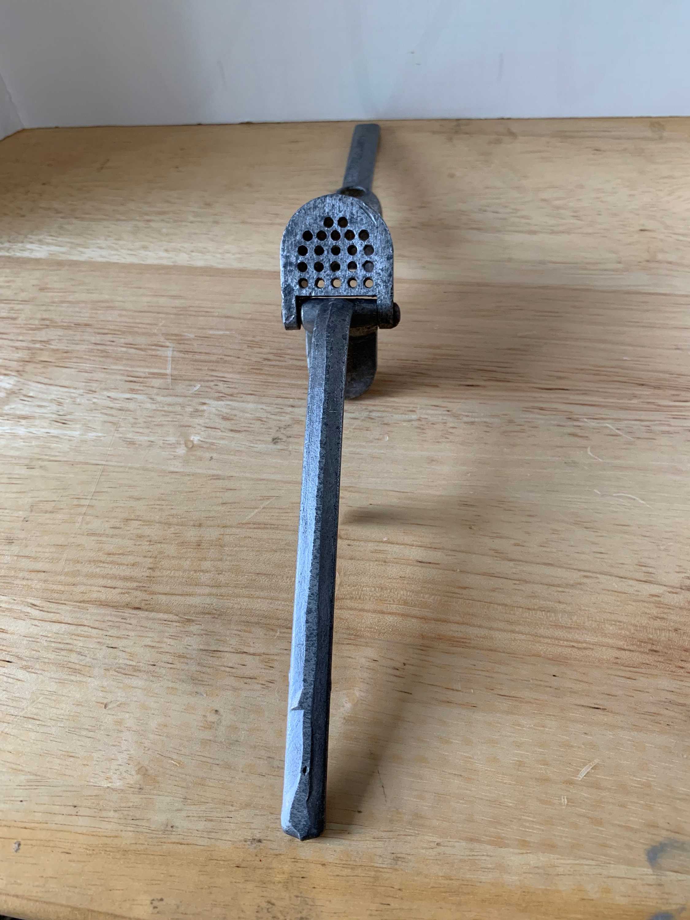 Vintage garlic press olive pitter from France
