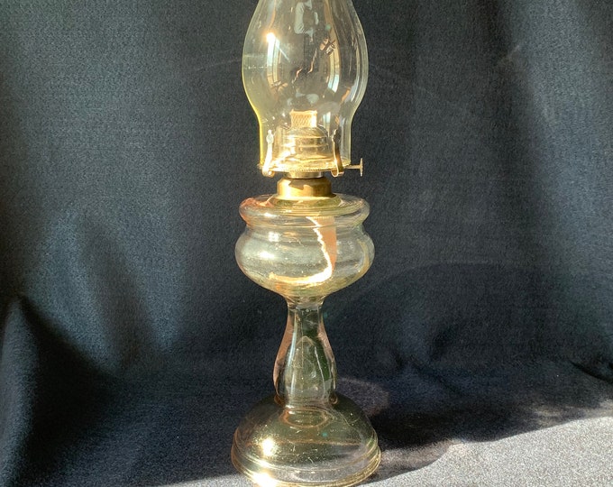Tall Clear glass oil lamp with oil guard rim, wick and chimney