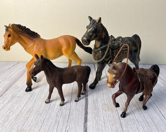Set of 4 Vintage plastic unmarked horse figurines