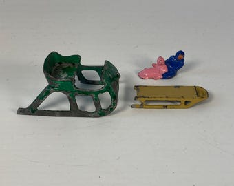 Set of 3 vintage Barclay Cast Metal Green Sleigh and Sled with Two figure riders