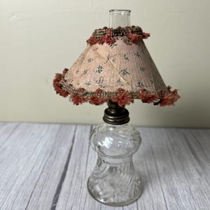 Vintage Small swirl Glass Oil Lamp with vintage pink paper and tassel shade chimney and wick