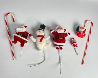 Set of 7 Vintage Flocked Santa, Snowman Picks and Plastic Candy canes