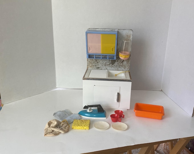 Vintage doll play kitchen/doctor  cupboard sink, sloped upper sliding door cupboard, soap dispenser and lower cupboard w/accessories