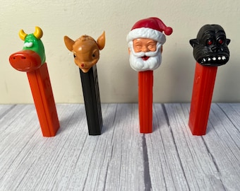 Choice of vintage no feet Pez Santa, Cow, Rudolph and gorilla